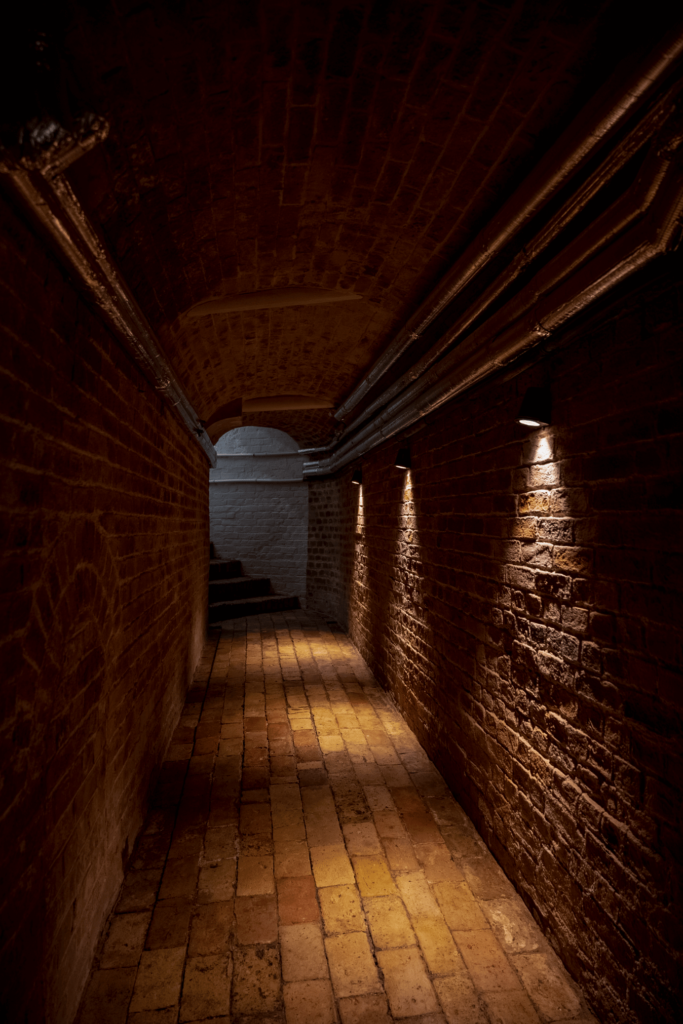 sandblasted brick cellar wall