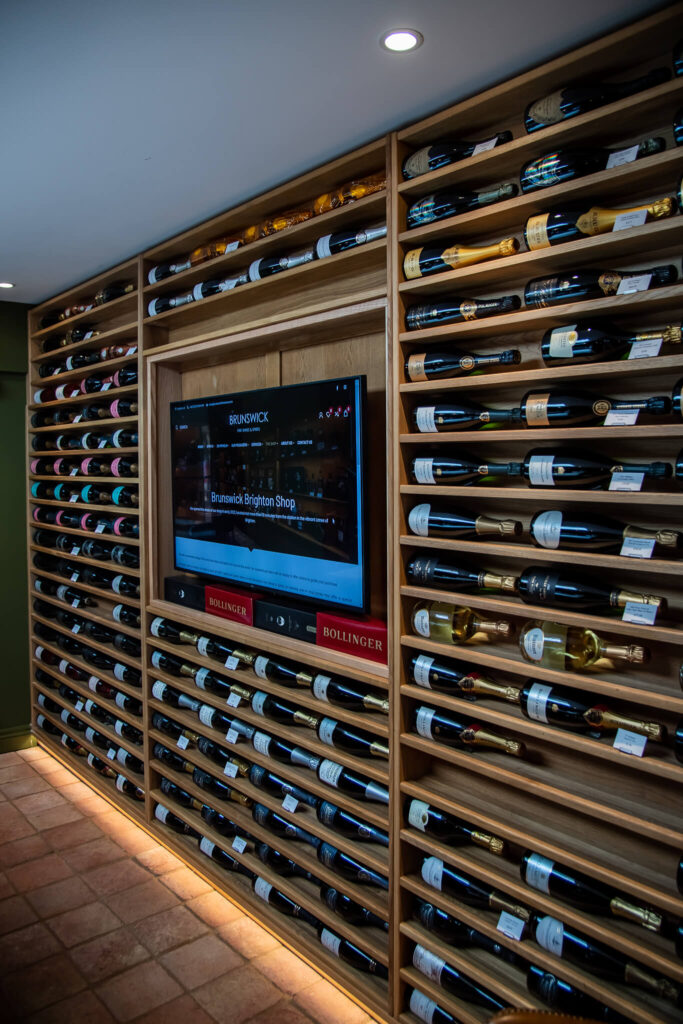 the display Champagne wall located in the tasting room for customers at Brunswick fine wines
