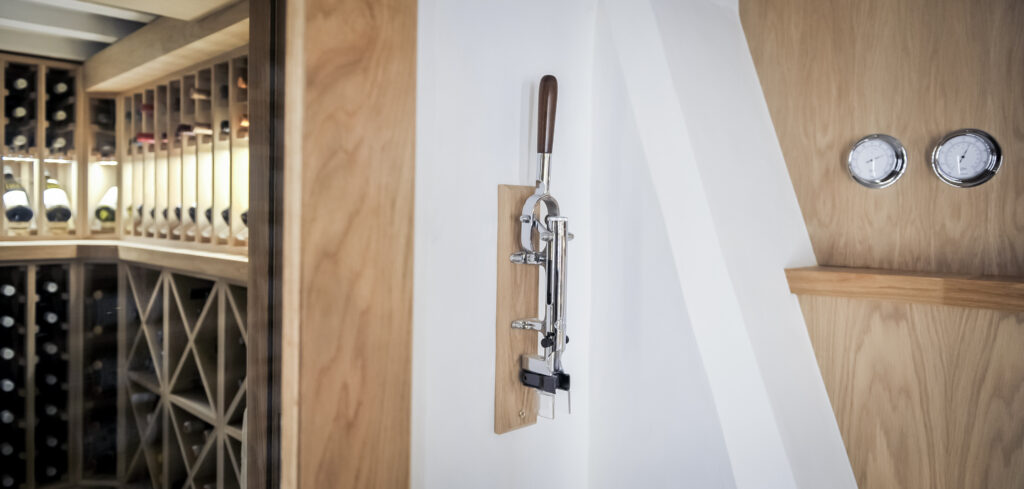 Heritage style wine cellar accessories in oak cellar