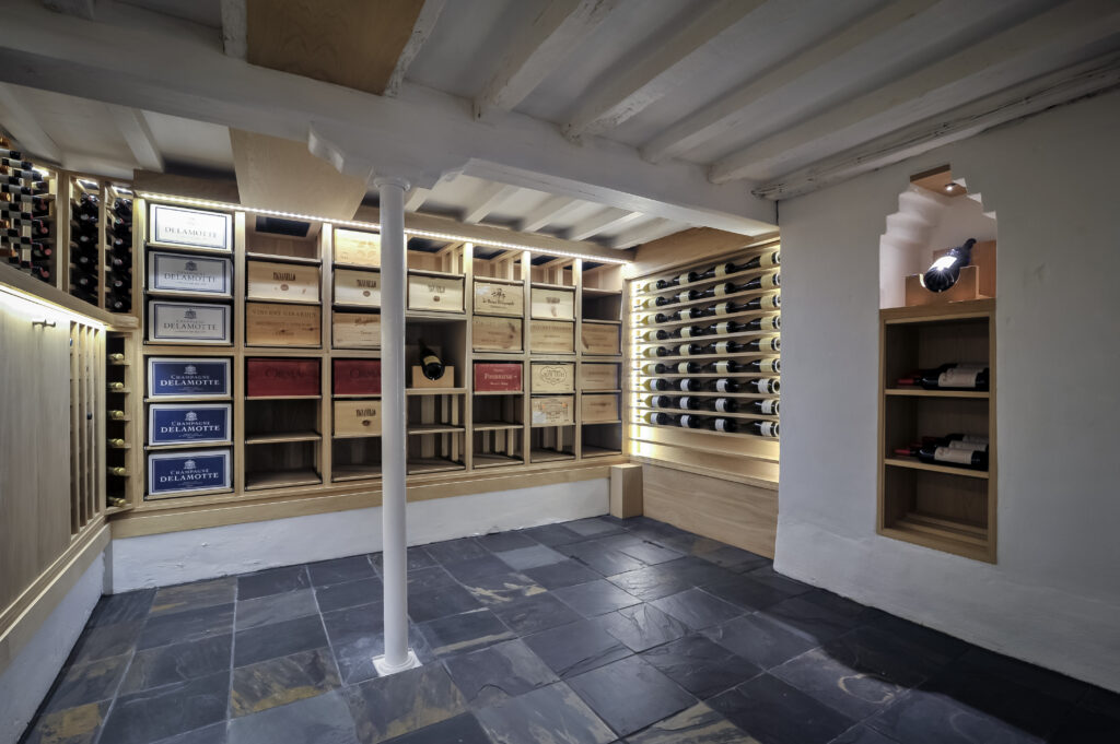 Soft close case storage drawers in bespoke wine cellar